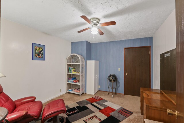6519I Myrtle Dr, Nine Mile Falls, WA 99026 - living area featuring ceiling fan, carpet, and a textured ceiling