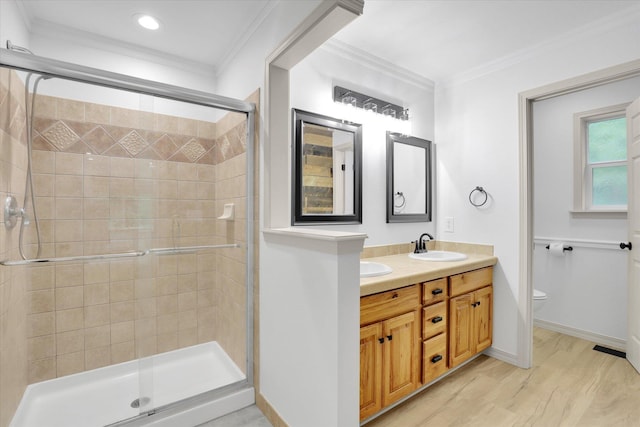 13306 N Muzzy Rd, Newman Lake, WA 99025 - full bathroom featuring a shower stall, double vanity, and crown molding