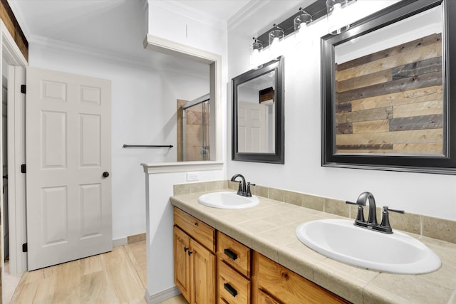 13306 N Muzzy Rd, Newman Lake, WA 99025 - bathroom featuring double vanity, crown molding, and a shower with shower door