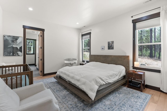 7617 S Cedar Rd, Spokane, WA 99224 - bedroom featuring recessed lighting and light wood-type flooring