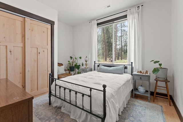 7617 S Cedar Rd, Spokane, WA 99224 - bedroom featuring wood finished floors and baseboards