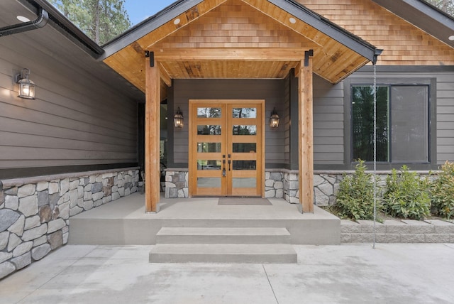 7617 S Cedar Rd, Spokane, WA 99224 - property entrance with stone siding, a porch, and french doors