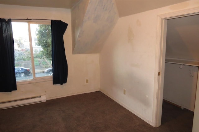 2613 W Gardner Ave, Spokane, WA 99201 - bonus room with baseboard heating, plenty of natural light, carpet floors, and vaulted ceiling
