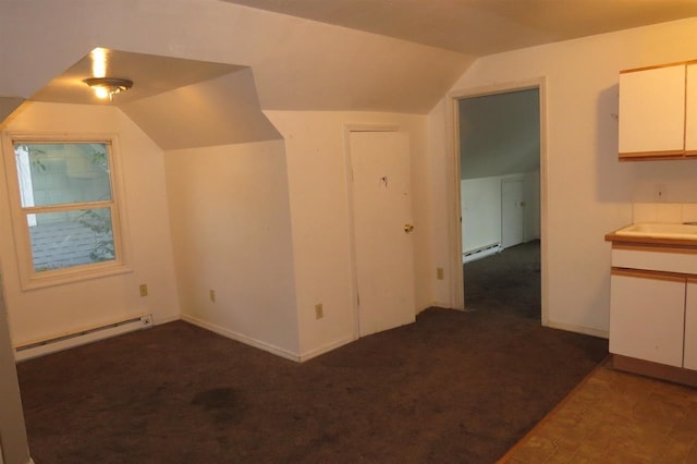 2613 W Gardner Ave, Spokane, WA 99201 - bonus room featuring a baseboard heating unit, lofted ceiling, and carpet