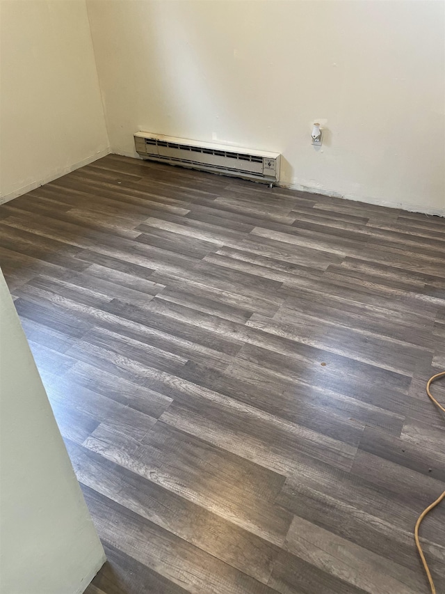 2613 W Gardner Ave, Spokane, WA 99201 - detailed view of a baseboard radiator and wood finished floors