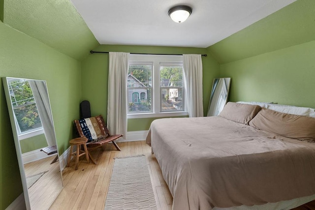 2103 W 5th Ave, Spokane, WA 99201 - bedroom with lofted ceiling and light wood-style floors