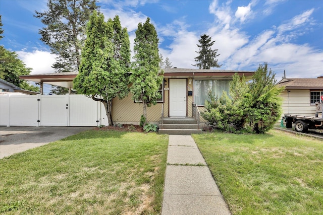 3511 W Francis Ave, Spokane, WA 99205 - view of front facade featuring a gate and a carport