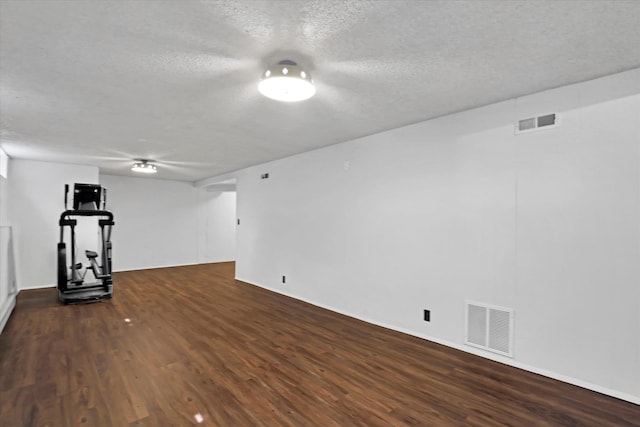 3511 W Francis Ave, Spokane, WA 99205 - finished below grade area featuring a textured ceiling and dark wood-type flooring
