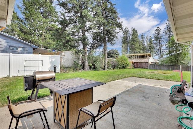 3511 W Francis Ave, Spokane, WA 99205 - fenced backyard with a patio