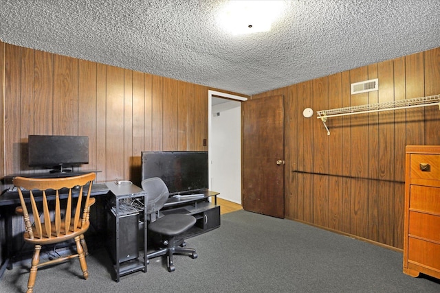 3511 W Francis Ave, Spokane, WA 99205 - office space with wood walls, a textured ceiling, and carpet floors