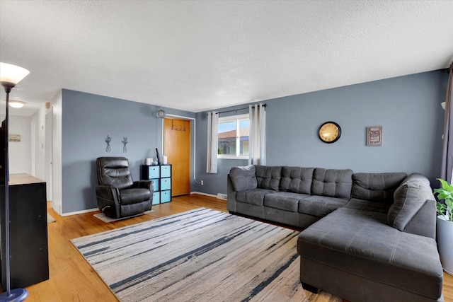 3511 W Francis Ave, Spokane, WA 99205 - living room with wood finished floors and a textured ceiling