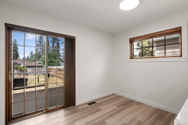 17 E 34th Ave, Spokane, WA 99203 - spare room featuring healthy amount of natural light and light wood-type flooring