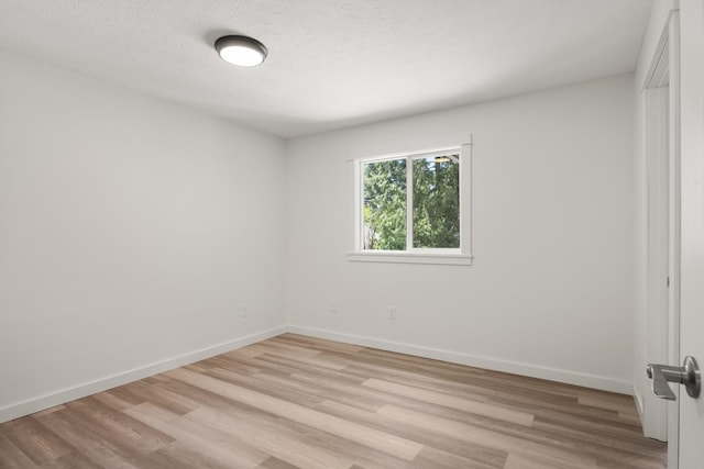 17 E 34th Ave, Spokane, WA 99203 - unfurnished room featuring light wood finished floors and baseboards