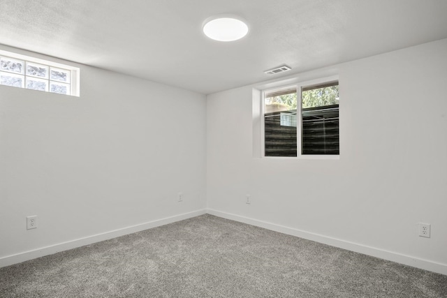 17 E 34th Ave, Spokane, WA 99203 - spare room featuring healthy amount of natural light and carpet flooring