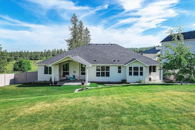 9302 W Floyd Dr, Cheney, WA 99004 - rear view of property with a patio, a shingled roof, and a gate