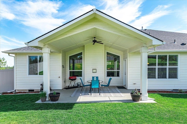 9302 W Floyd Dr, Cheney, WA 99004 - rear view of house with ceiling fan, a yard, roof with shingles, and a patio