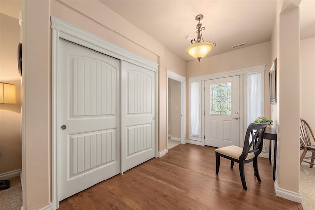 9302 W Floyd Dr, Cheney, WA 99004 - foyer entrance with wood finished floors and baseboards