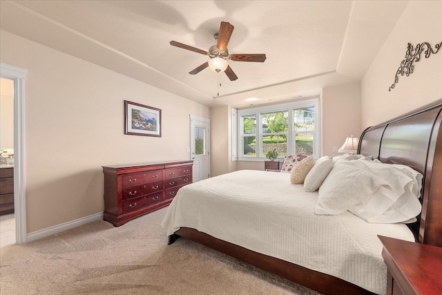9302 W Floyd Dr, Cheney, WA 99004 - bedroom with a raised ceiling, carpet floors, and a ceiling fan