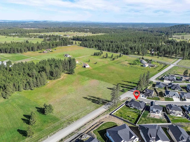 9302 W Floyd Dr, Cheney, WA 99004 - aerial overview of property's location featuring a heavily wooded area