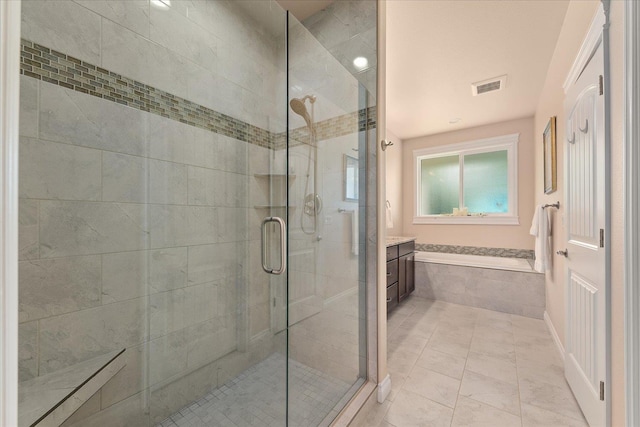 9302 W Floyd Dr, Cheney, WA 99004 - bathroom featuring a shower stall, a bath, and vanity