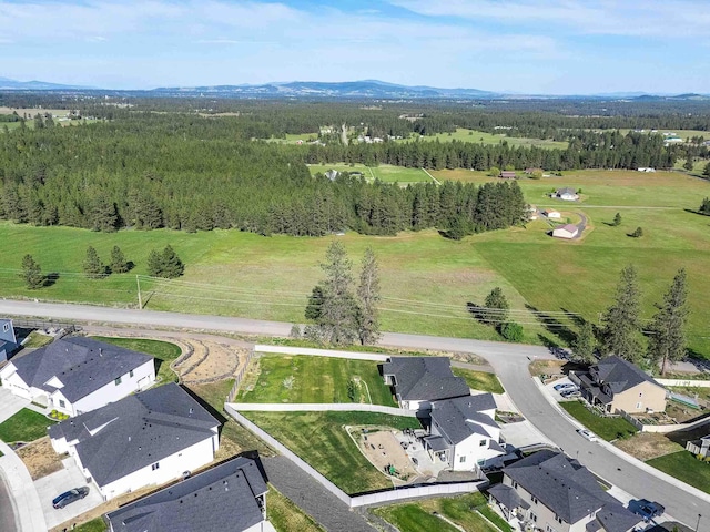 9302 W Floyd Dr, Cheney, WA 99004 - aerial perspective of suburban area with a heavily wooded area