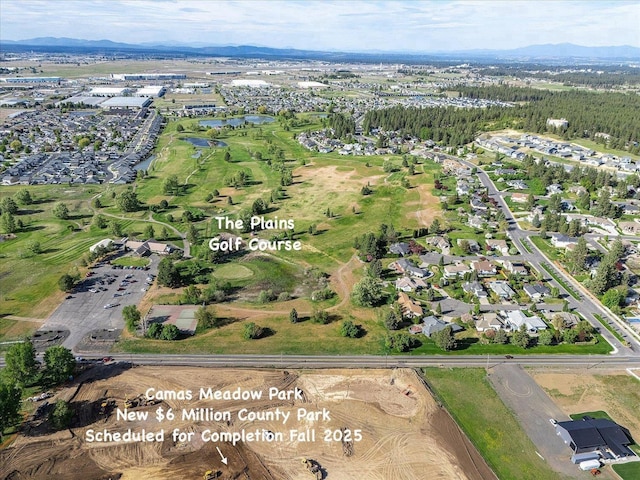 9302 W Floyd Dr, Cheney, WA 99004 - aerial view of property's location with a water and mountain view