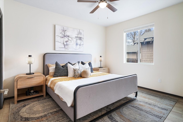 10718 E Augusta Rd, Spokane, WA 99207 - bedroom with wood finished floors and a ceiling fan