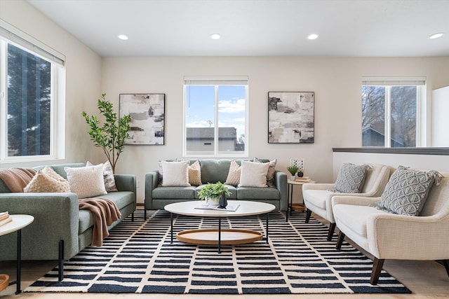10718 E Augusta Rd, Spokane, WA 99207 - living room featuring healthy amount of natural light, recessed lighting, and wood finished floors