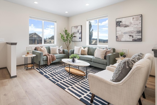 10718 E Augusta Rd, Spokane, WA 99207 - living area featuring plenty of natural light, light wood-style floors, and recessed lighting