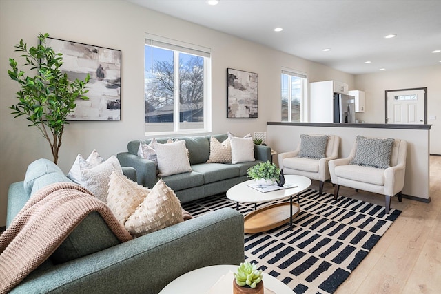 10718 E Augusta Rd, Spokane, WA 99207 - living room featuring light wood-type flooring and recessed lighting