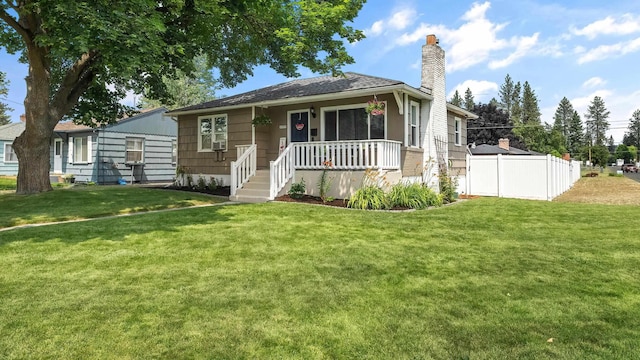 4204 W Olympic Ave, Spokane, WA 99205 - bungalow-style house with a chimney and covered porch