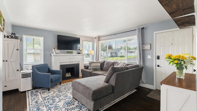 4204 W Olympic Ave, Spokane, WA 99205 - living room featuring dark wood-style floors and a fireplace with flush hearth