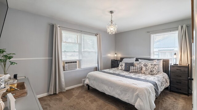 4204 W Olympic Ave, Spokane, WA 99205 - bedroom featuring carpet floors and a chandelier
