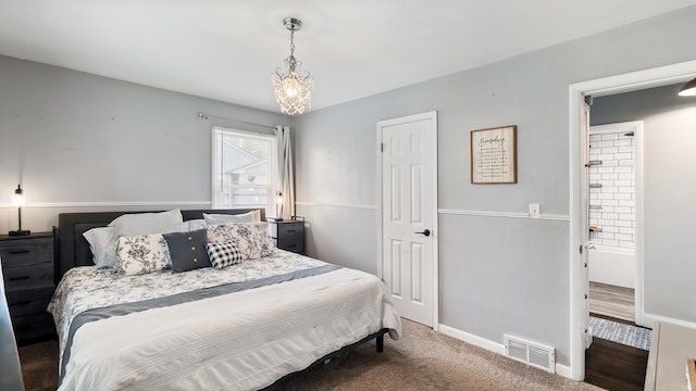 4204 W Olympic Ave, Spokane, WA 99205 - bedroom featuring a chandelier and carpet floors