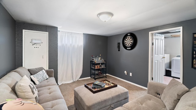4204 W Olympic Ave, Spokane, WA 99205 - carpeted living room featuring washer / clothes dryer and baseboards