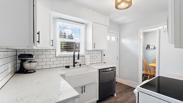 4204 W Olympic Ave, Spokane, WA 99205 - kitchen with dishwashing machine, white electric range, white cabinetry, and tasteful backsplash