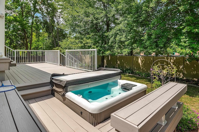 2913 E 61st Ct, Spokane, WA 99223 - wooden deck with a covered hot tub and view of scattered trees