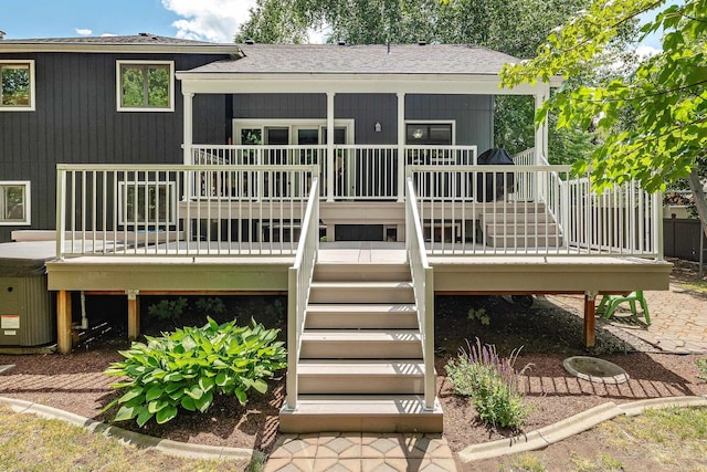 2913 E 61st Ct, Spokane, WA 99223 - back of property with stairs, a deck, and a shingled roof