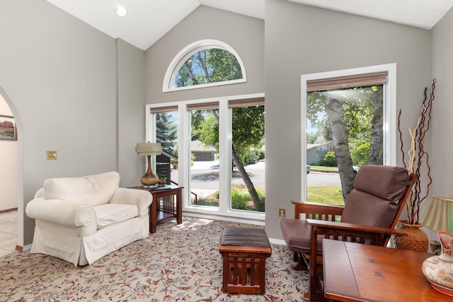 2913 E 61st Ct, Spokane, WA 99223 - sitting room featuring high vaulted ceiling and baseboards