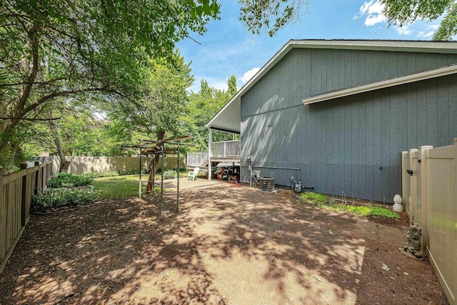 2913 E 61st Ct, Spokane, WA 99223 - view of side of home featuring a fenced backyard and a patio