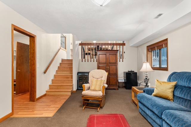 2913 E 61st Ct, Spokane, WA 99223 - living room featuring stairs and carpet flooring