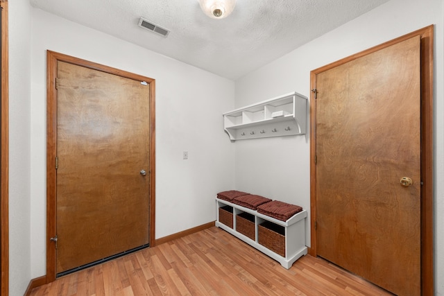 2913 E 61st Ct, Spokane, WA 99223 - mudroom with light wood-type flooring and baseboards