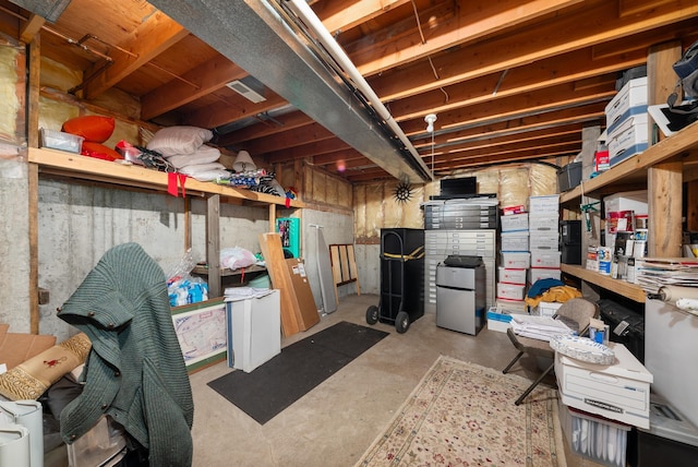 2913 E 61st Ct, Spokane, WA 99223 - unfinished basement featuring freestanding refrigerator