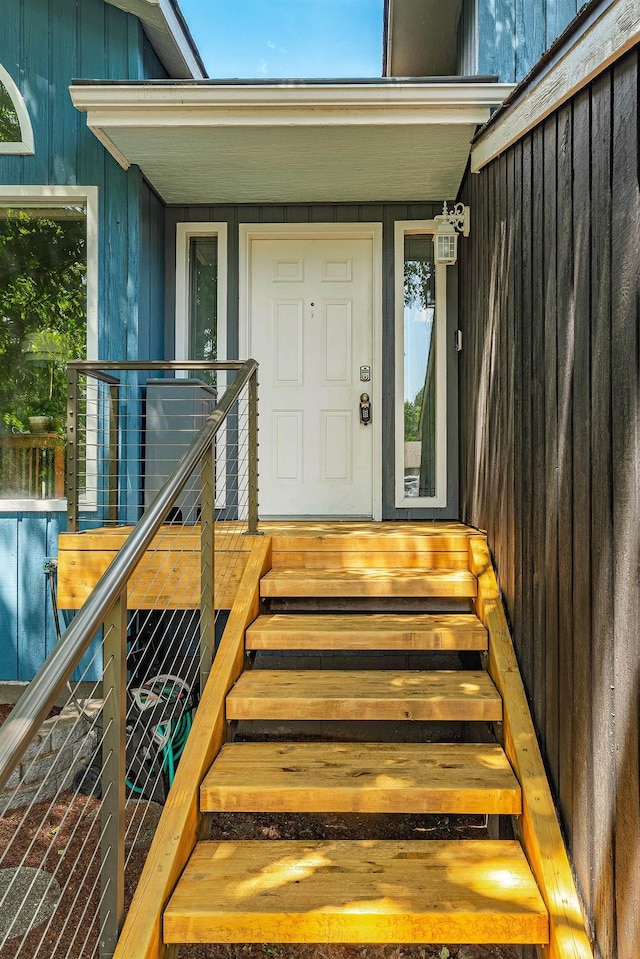 2913 E 61st Ct, Spokane, WA 99223 - doorway to property featuring board and batten siding