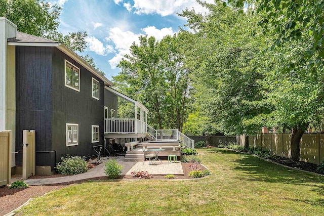2913 E 61st Ct, Spokane, WA 99223 - fenced backyard featuring a patio area and a wooden deck