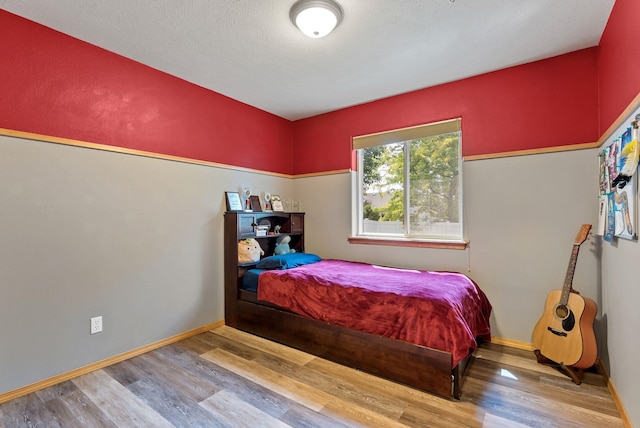 3518 S Woodlawn Dr, Spokane Valley, WA 99206 - bedroom with wood finished floors