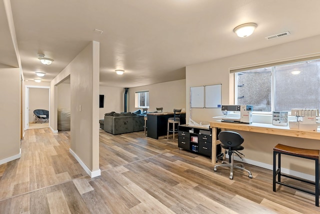 3518 S Woodlawn Dr, Spokane Valley, WA 99206 - home office featuring light wood finished floors and baseboards