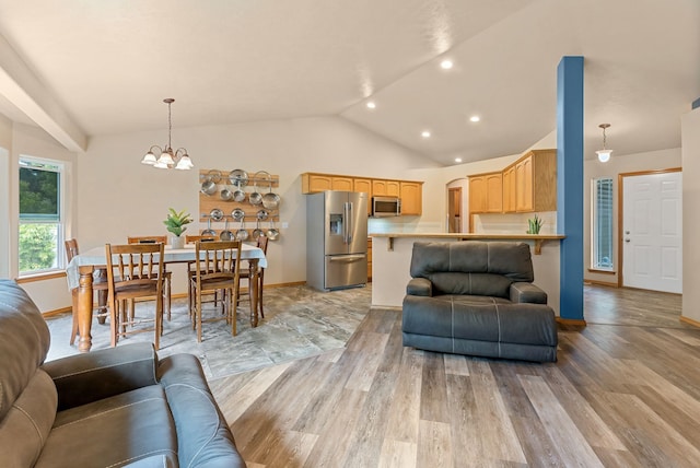 3518 S Woodlawn Dr, Spokane Valley, WA 99206 - living room featuring light wood finished floors, vaulted ceiling, a chandelier, and recessed lighting