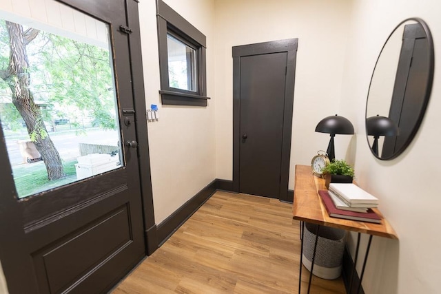 2514 4th Ave, Spokane, WA 99202 - doorway to outside with light wood-style flooring and baseboards