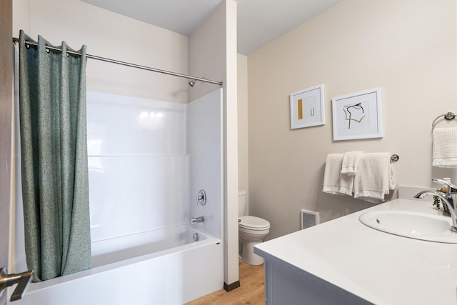 2519 N Columbus Rd, Spokane, WA 99207 - full bathroom featuring  shower combination, vanity, and wood finished floors